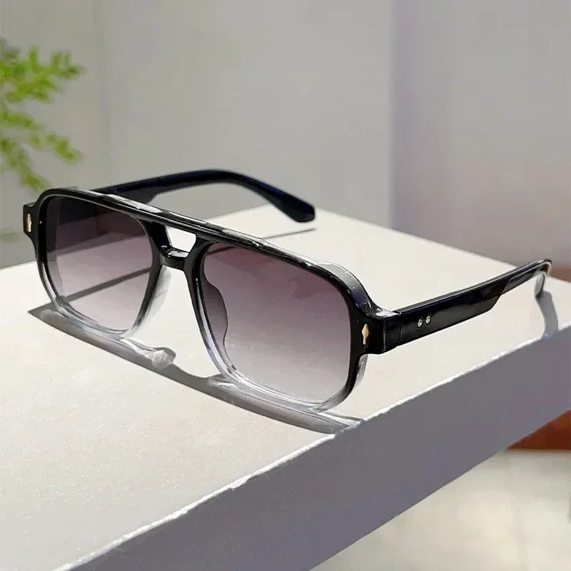 Close-up on the scratch resistant lenses of unisex rectangular UV400 sunglasses