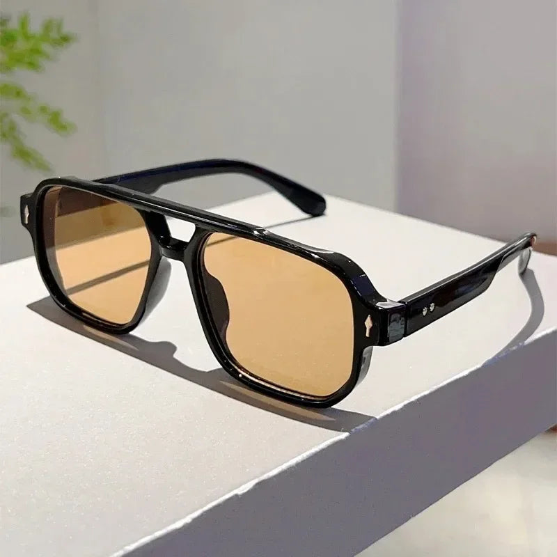 Rectangular UV400 sunglasses with a bold black frame, unisex design, front view