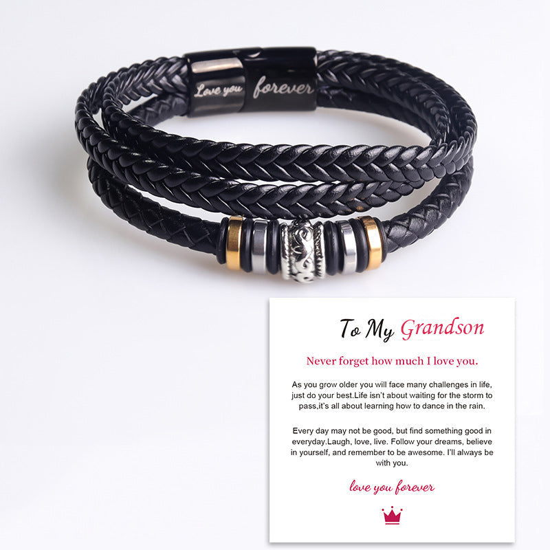 Unisex accessory: double row braided leather bracelet with sleek stainless steel clasp, a timeless fashion piece.