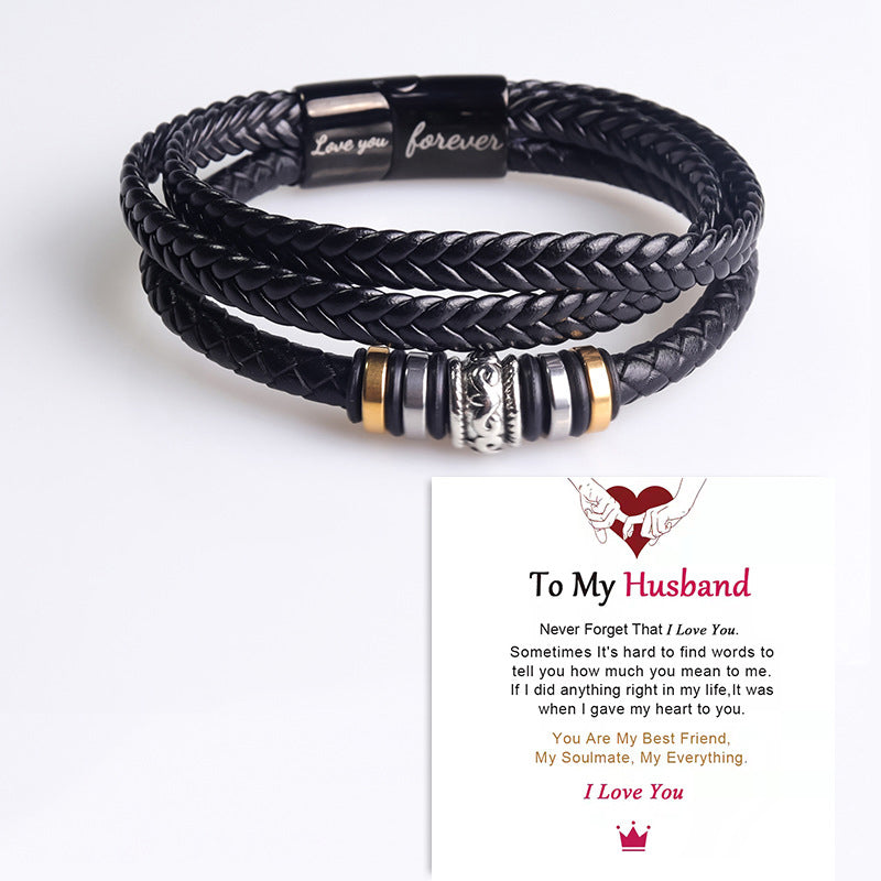 Front view of a black braided leather double row bracelet with a magnetic stainless steel closure, men's fashion.