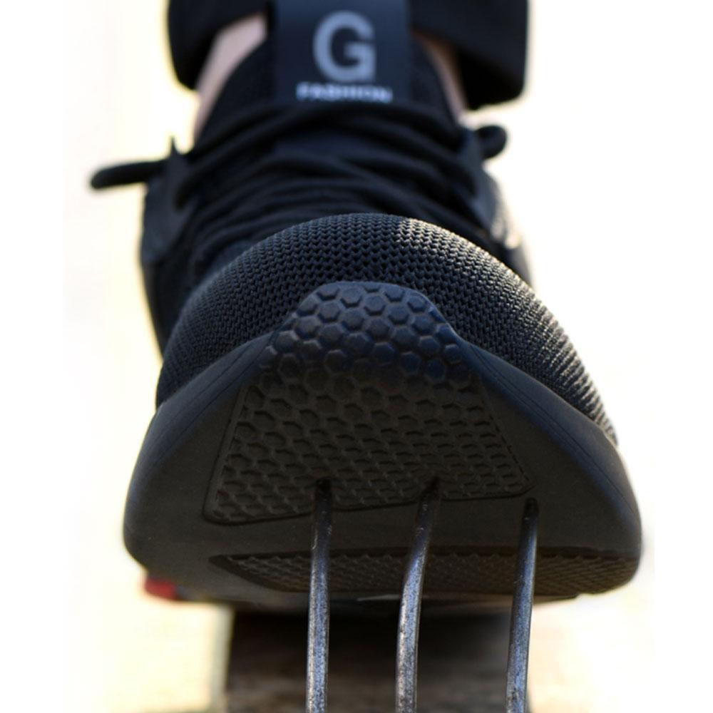 Action shot of unisex worker wearing breathable safety work shoes on a construction site, emphasizing utility