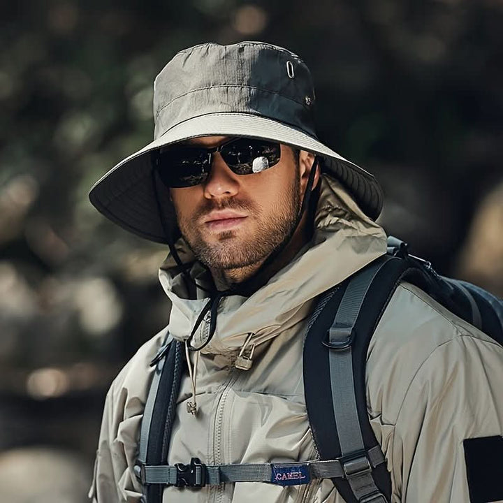 Protective unisex UV sun hat, ideal for hiking, fishing, and camping. Breathable, adjustable outdoor headwear for summer.