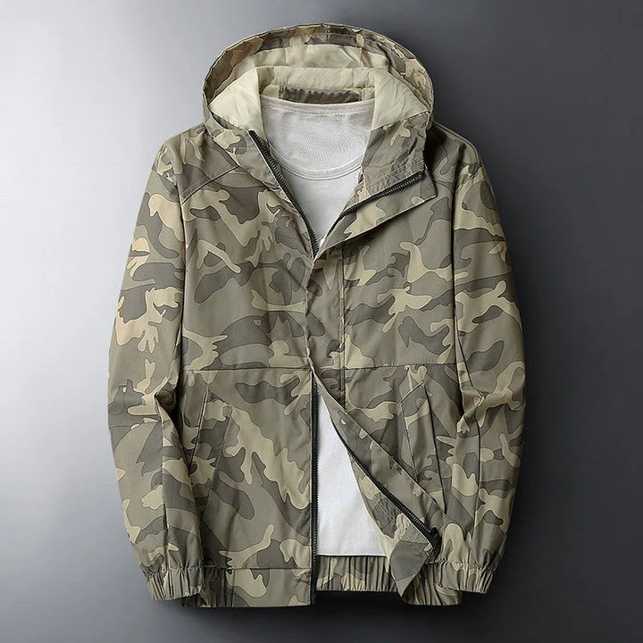 Close-up of water-resistant camo windbreaker jacket fabric, highlighting insulated detail for warmth