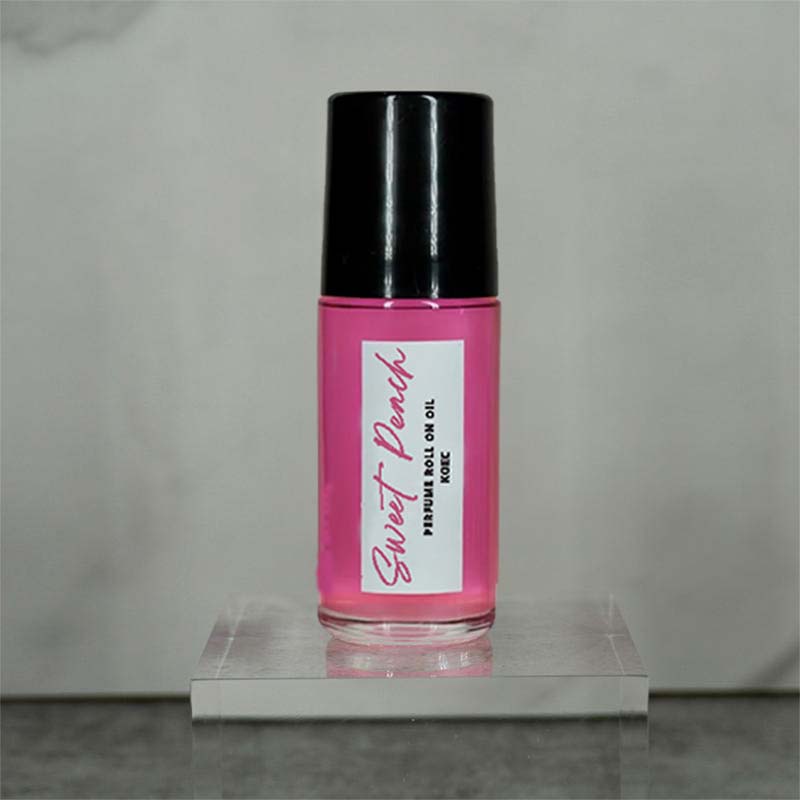 Captivating Roll-On Fragrance Oil, a perfect blend of peach and vanilla, designed to enhance your natural allure.