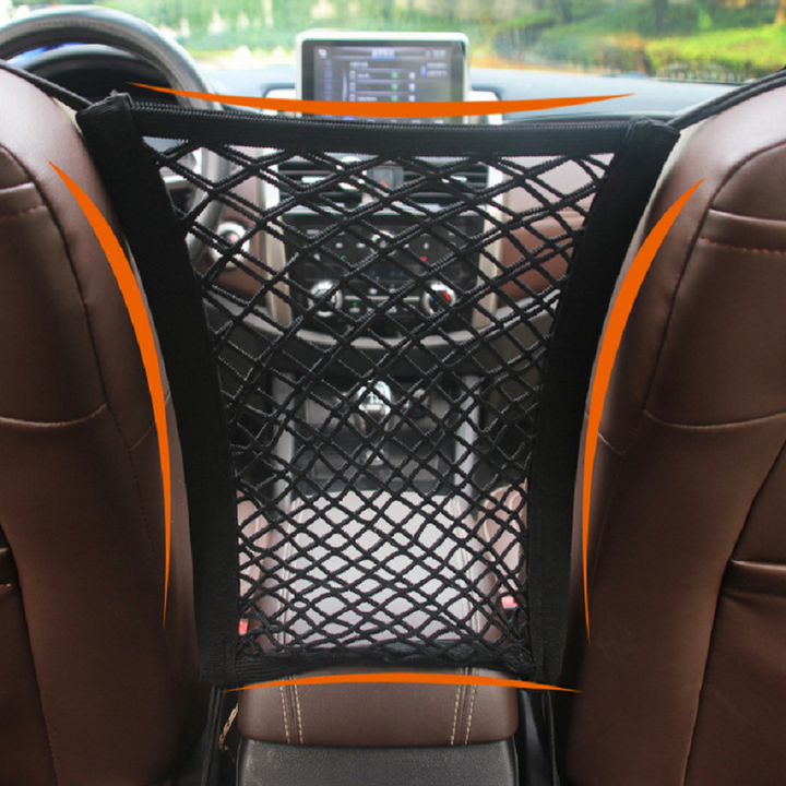 Car seat storage net organizer acting as a pet barrier between car's front and back seats