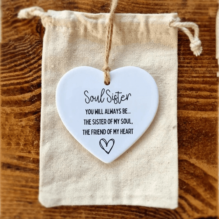 Keepsake heart crafted from ceramic, conveying a message of gratitude or comfort; a beautiful quote decor item.