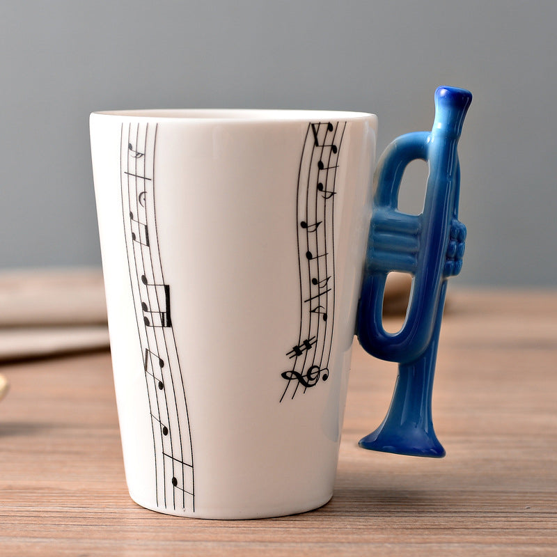 Piano handle ceramic coffee mug, classic black and white, a sophisticated gift for a music lover's desk