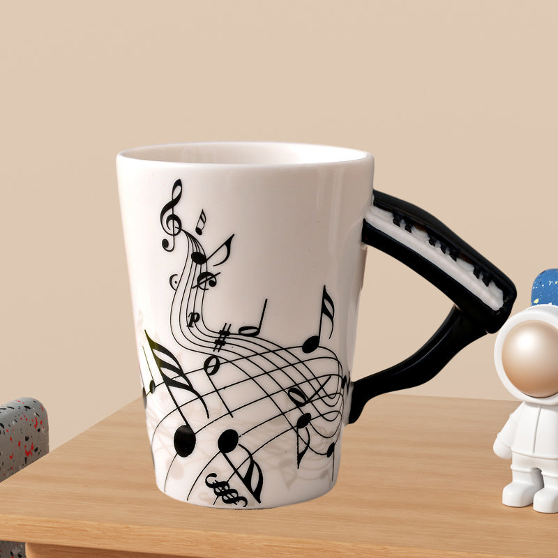 Ceramic coffee mug with a musical violin handle, a perfect gift for violinists & classical music fans