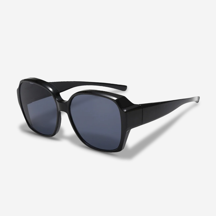 Clip-on driving shades for prescription eyewear, featuring UV400 protection & glare reduction for clearer vision.