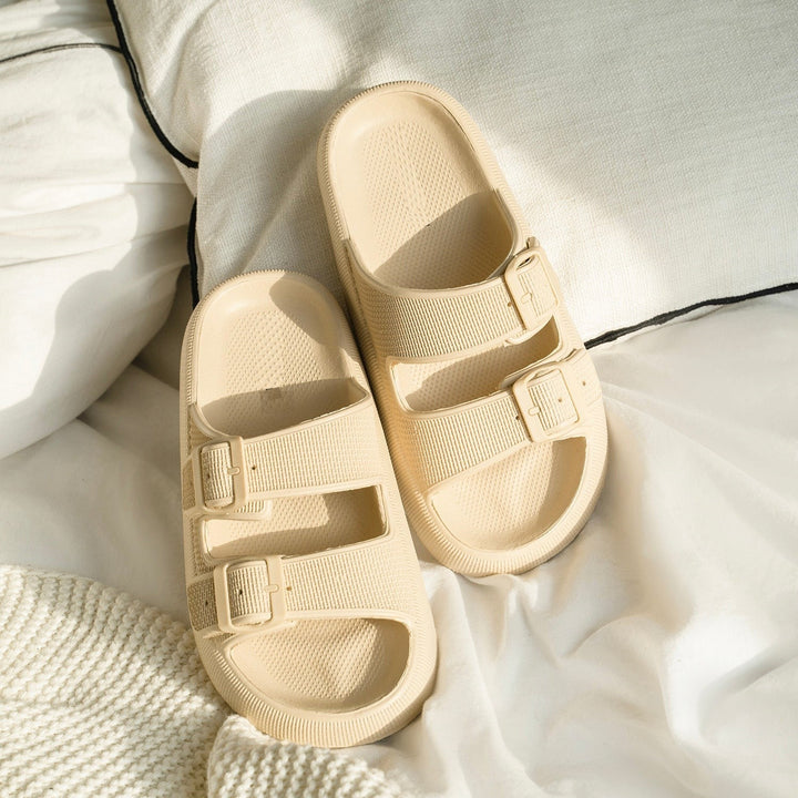 Unisex Cloud Cushion Pillow Slides in light blue, showing soft sole and slip-on design for ultimate comfort.