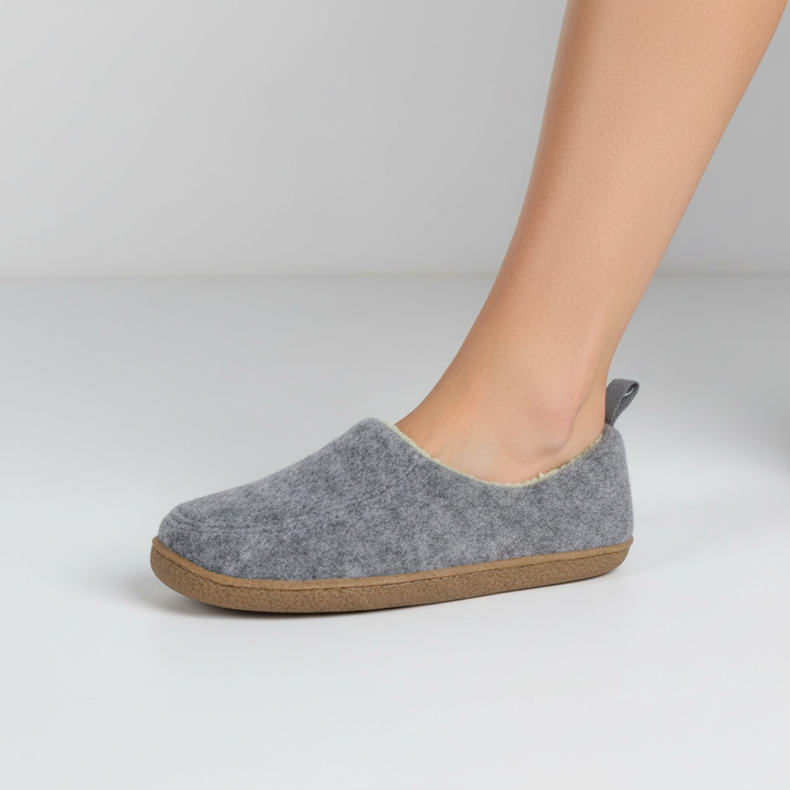 Unisex Cloudwalk slippers for ultimate warmth. Plush-lined, non-slip house shoes for cozy everyday comfort.
