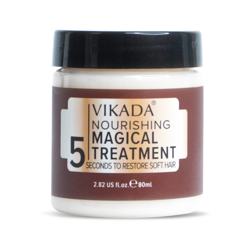 Close-up of Collagen Deep Repair Hair Treatment's rich texture, perfect for deep conditioning and frizz control.