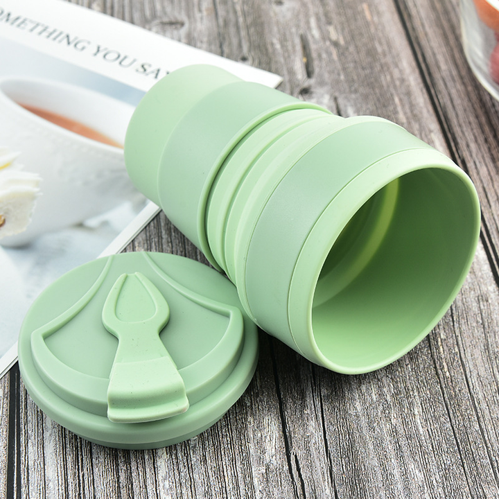 Yellow eco-friendly collapsible water bottle, soft silicone, durable drinkware for all ages