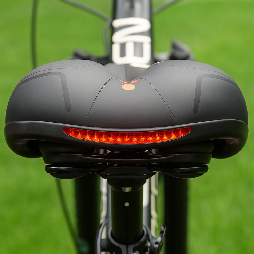 Plush suspension bike saddle for road, mountain, & commuter bikes, ensuring ergonomic cycling comfort.