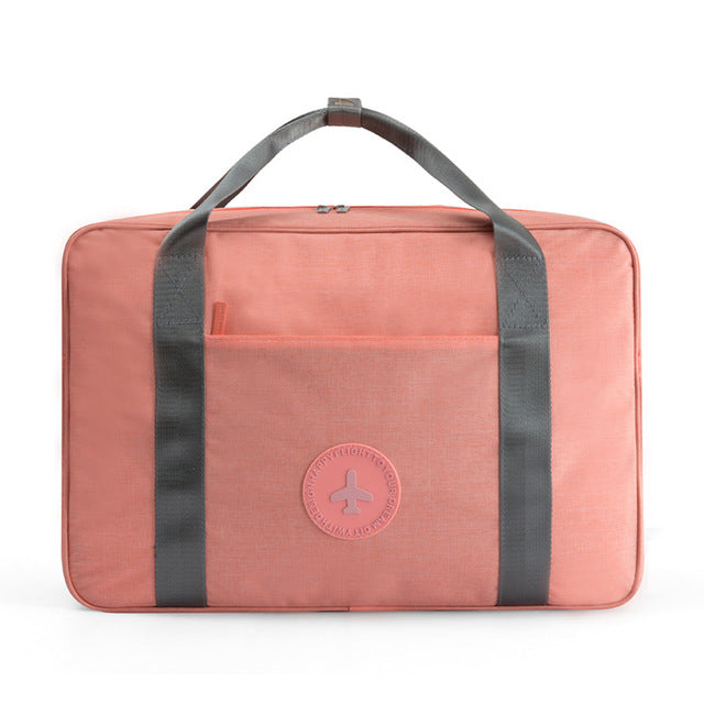 Water-resistant universal carry-on luggage with shoulder strap, perfect for weekend trips.
