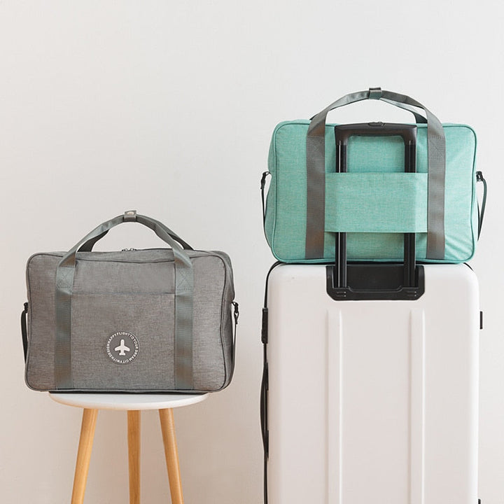 Stylish unisex shoulder bag, a compact carry-on for modern travel adventures.