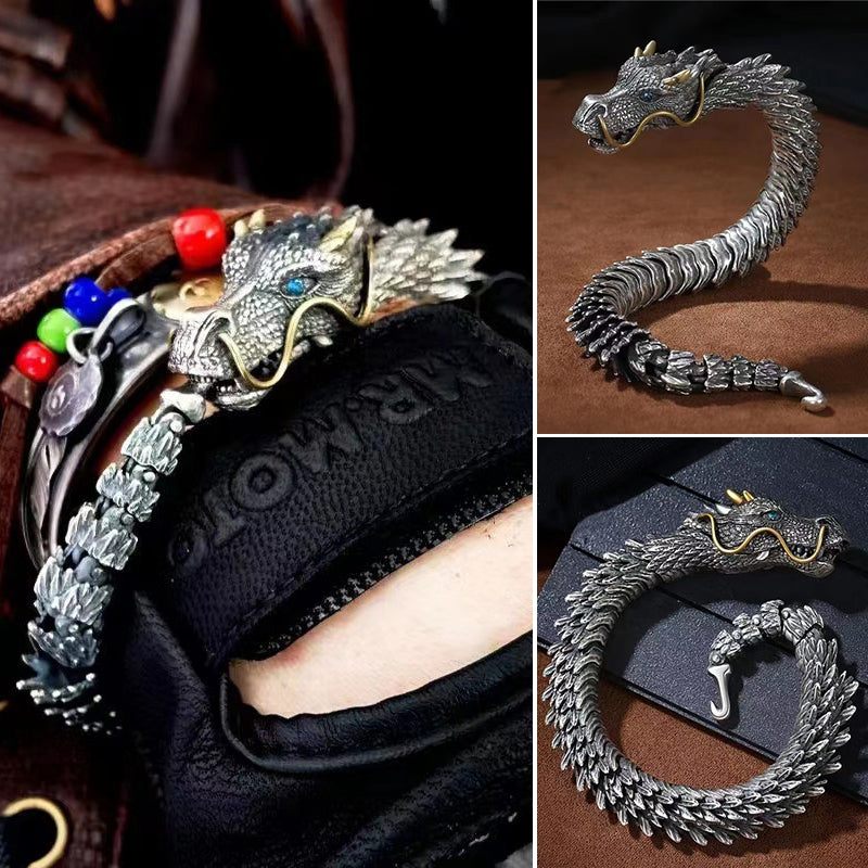 Studio shot of a unisex vintage copper dragon chain bracelet on a neutral background