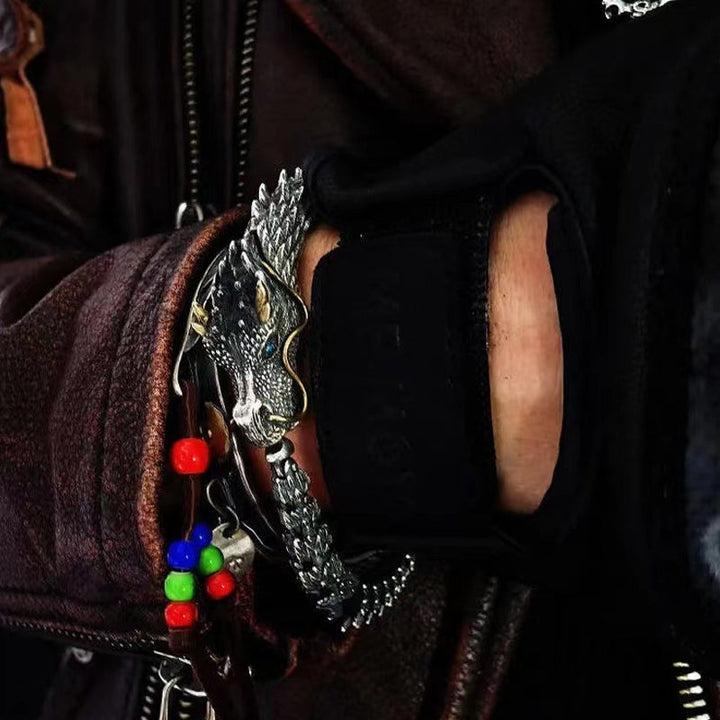 Detailed view of the vintage style copper chain and dragon clasp on a unisex bracelet