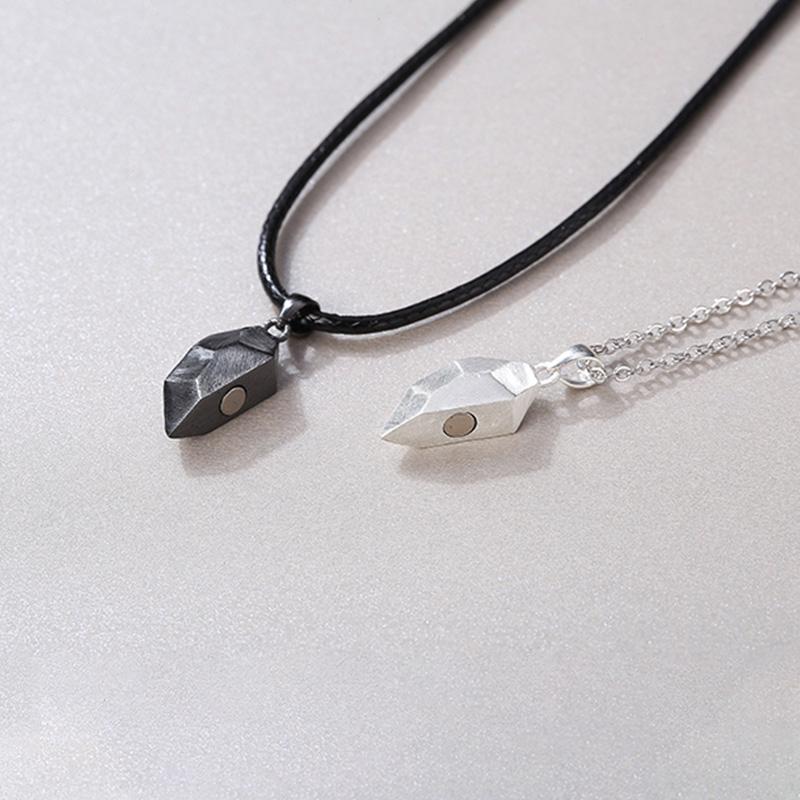 Matching alloy couple necklace featuring an interlocking heart pendant, unisex and symbolic jewelry