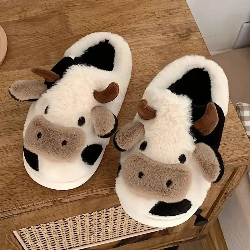 Unisex cozy black & white cow plush slippers, perfect for ultimate home comfort & indoor warmth.
