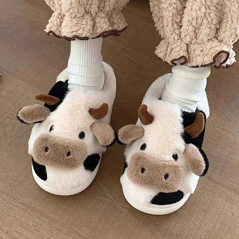 Comfy unisex cow slippers, plush indoor footwear for cozy winter days & fun autumn home comfort.