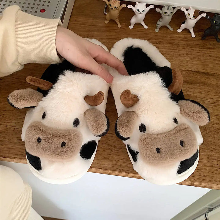 Pair of cozy unisex cow plush slippers, perfect indoor animal footwear for autumn & winter home comfort.