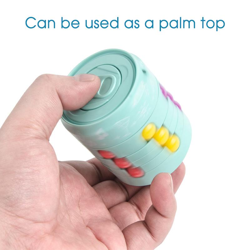 Child's hand spinning a creative magic cube toy, demonstrating its use as a fun sensory toy for kids