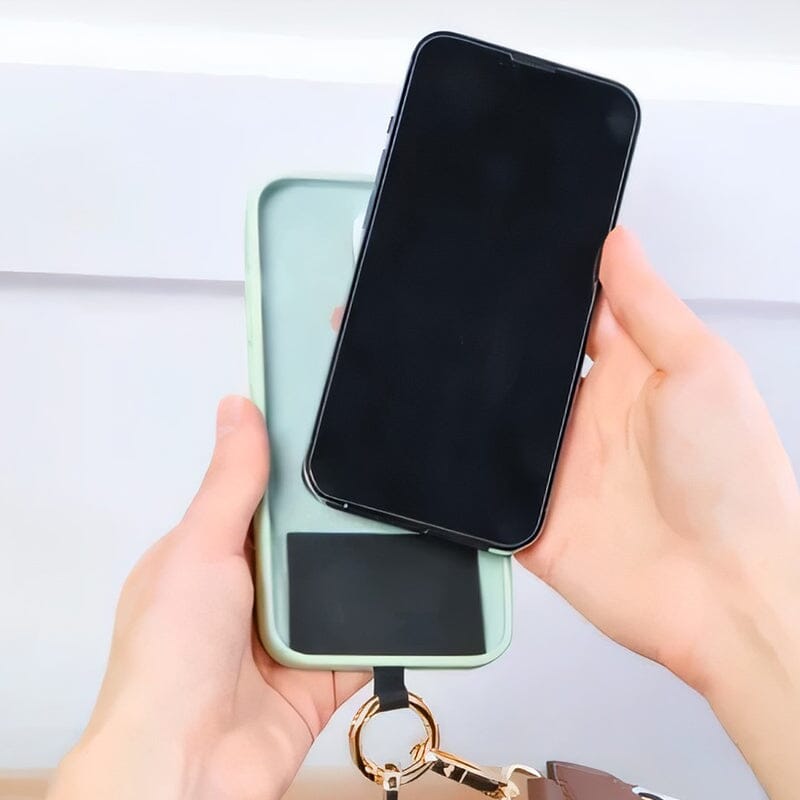Crossbody phone holder with a black nylon strap and a useful zipper pouch, perfect for active lifestyles.