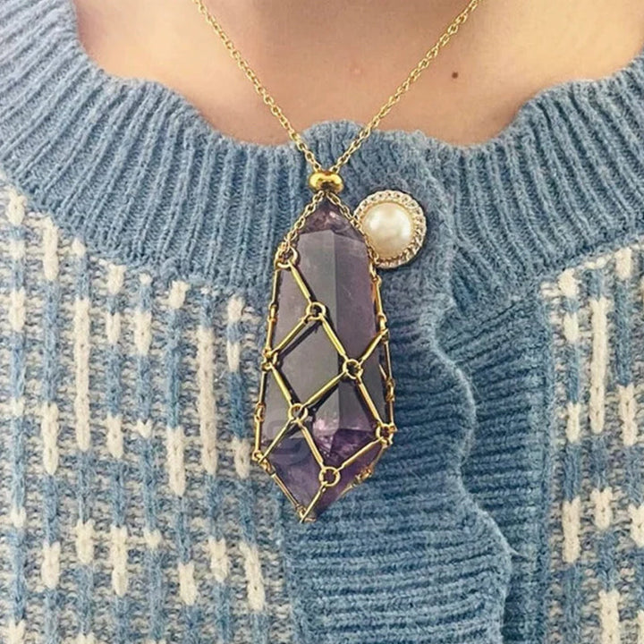 Crystal cage pendant necklace with a natural amethyst stone inside, spiritual healing jewelry
