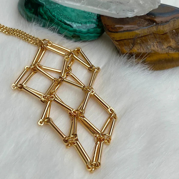Rose gold crystal cage pendant with a rose quartz crystal, love and compassion necklace