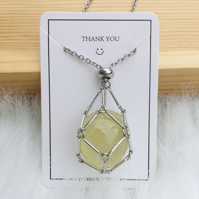 Silver crystal cage necklace, empty, with a secure latch mechanism, reliable jewelry