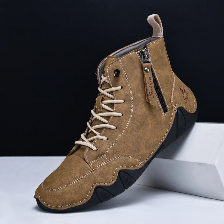 Pair of Unisex Zip Boots with orthopedic cushioning, brown, front view, comfortable footwear