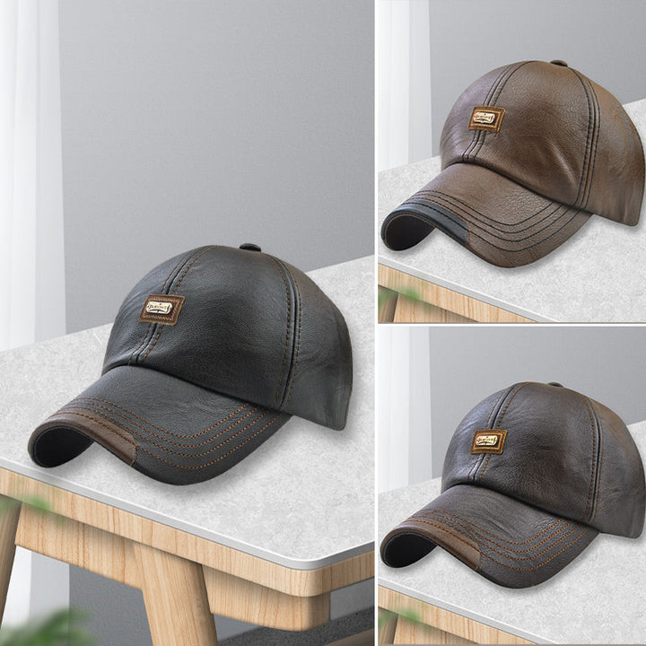 Black PU leather baseball cap on a white background, highlighting its premium material