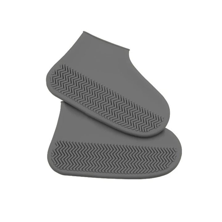 Portable DryStep waterproof overshoes, a travel essential for keeping footwear dry in any wet environment.