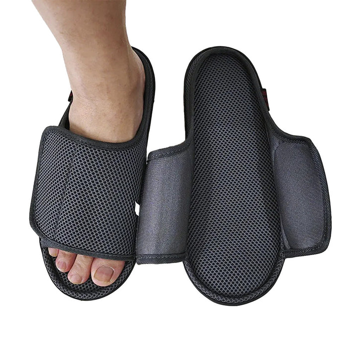 Unisex easy-wear openable slippers for swollen feet. Adjustable comfort diabetic footwear with hook and loop closure.