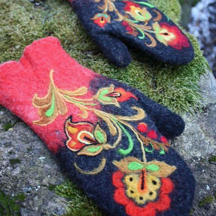 Warm unisex winter mittens made from wool, adorned with beautiful floral embroidery for cold days