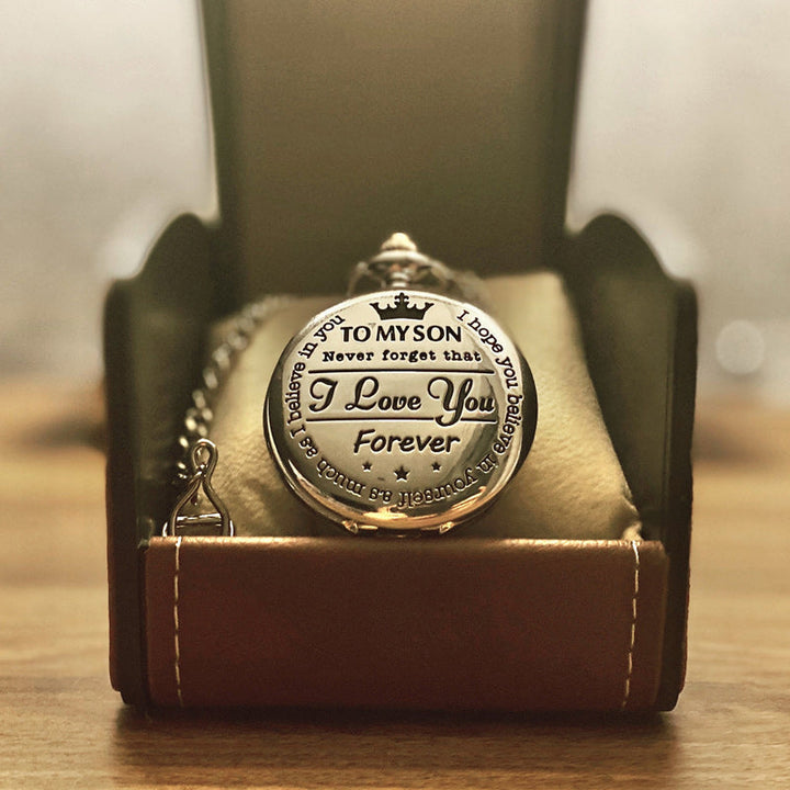 Unisex gold engraved pocket watch with matching chain, elegant accessory for any occasion