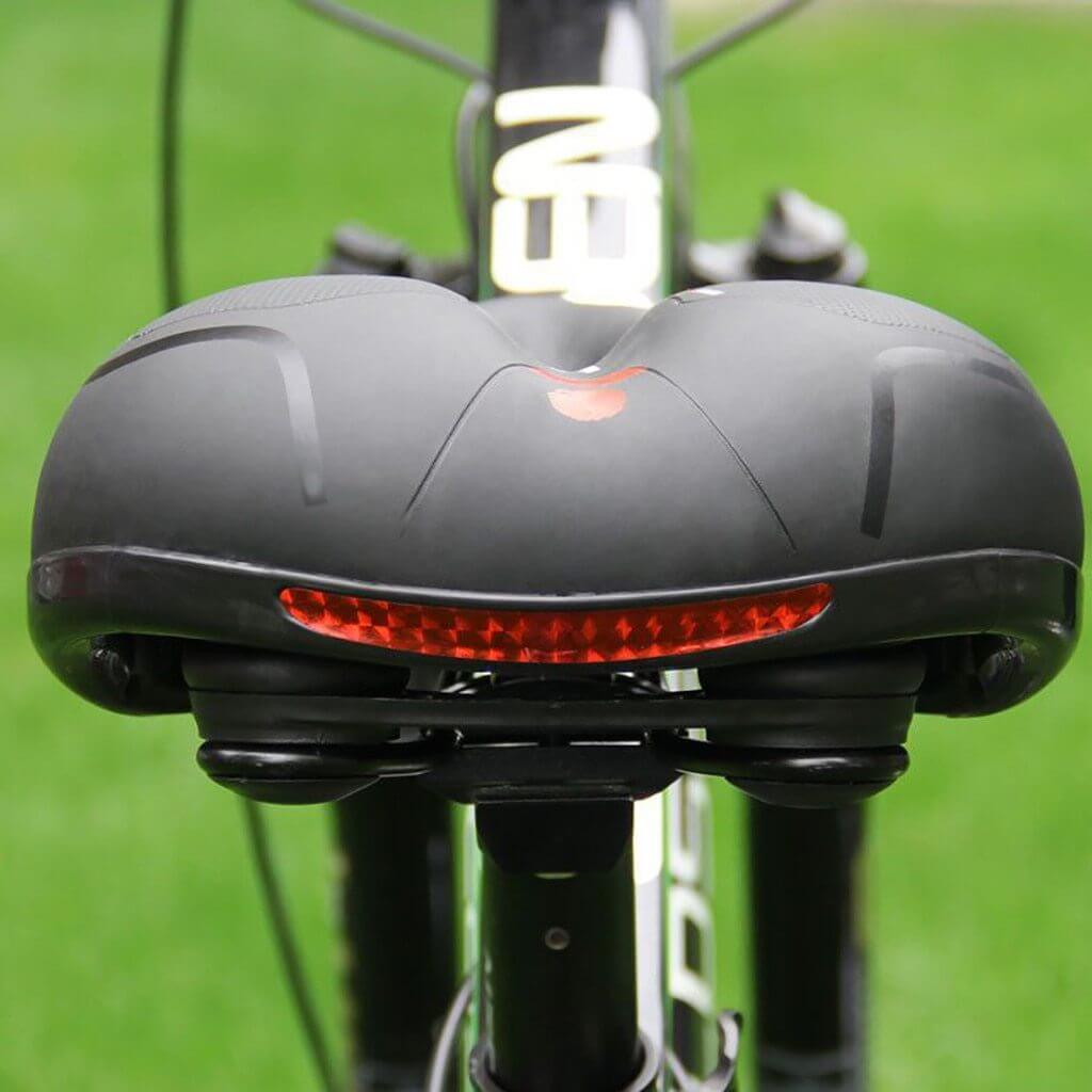 Ergonomic unisex bike saddle for mountain & road bikes. Waterproof, shock-absorbing design ensures pain relief.