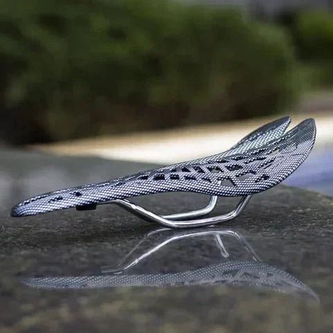 Unisex ergonomic comfort bicycle saddle, padded for enhanced riding on road & mountain bikes. Durable cycling accessory.