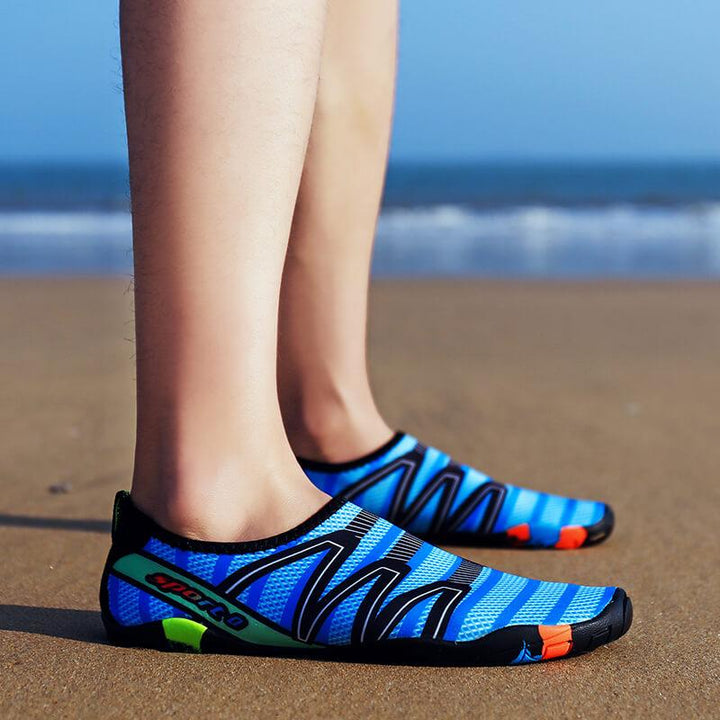 Lightweight unisex aqua shoes with non-slip grip. Fast-drying for beach & water sports protection.