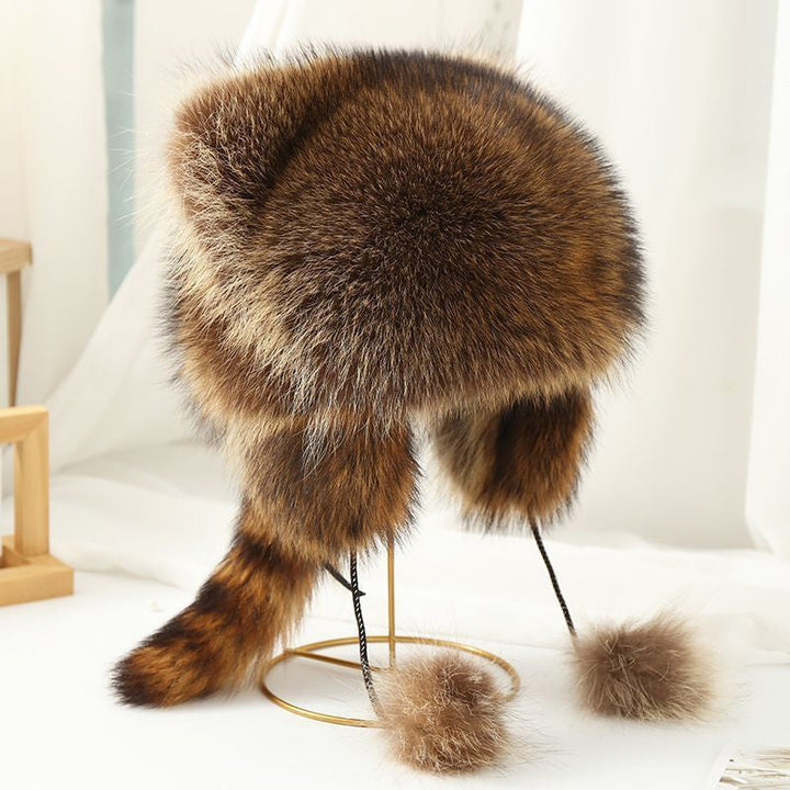 Unisex plush faux fur winter hat featuring a fun raccoon tail design