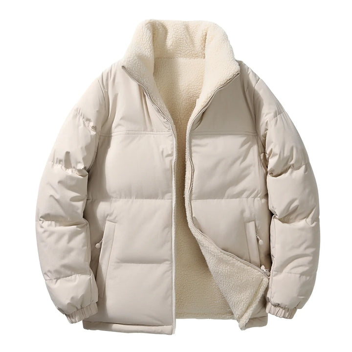 Unisex model wearing a fleece-lined puffer jacket outdoors, illustrating its winter functionality and style.
