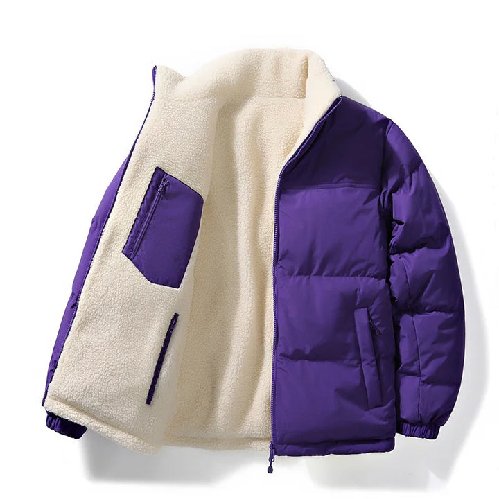 Close-up of the durable, water-resistant fabric of a unisex insulated puffer jacket, ideal for winter.