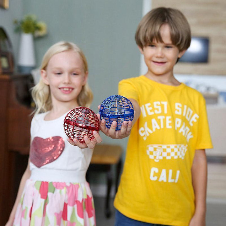 Recreational flying orb toy with built-in LED lights, appearing to float effortlessly in the air