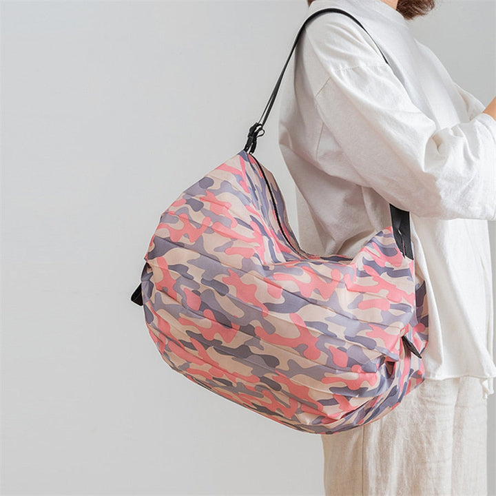 Eco-friendly reusable grocery bag, large capacity foldable tote, durable for all your shopping & travel needs.