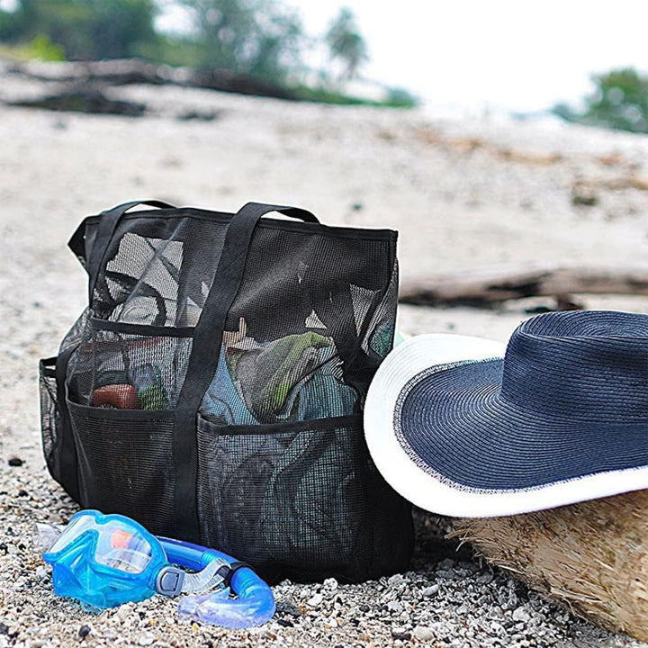 Large capacity mesh tote bag, foldable for easy travel. Ideal family beach & pool bag for organization and convenience.