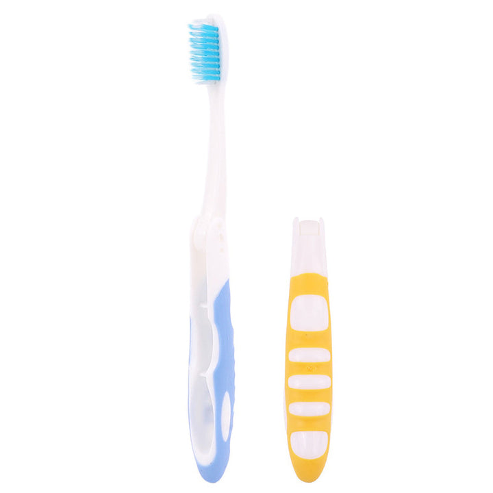 Kids' size folding travel toothbrush, yellow, promoting good oral care while traveling