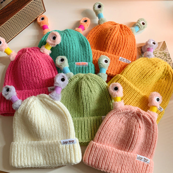Unisex Fun Monster Knit Beanie in blue with playful monster eyes