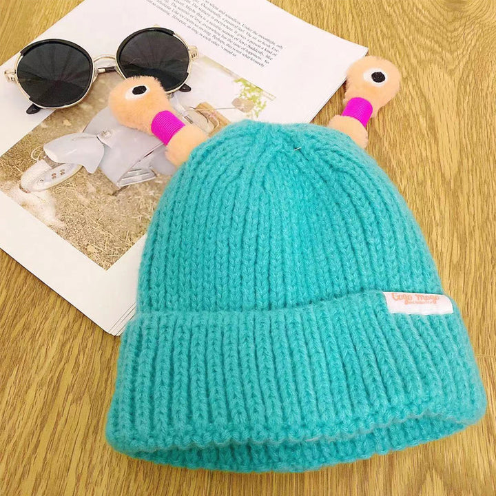 Unisex Monster Knit Beanie in orange, a vibrant and warm winter hat