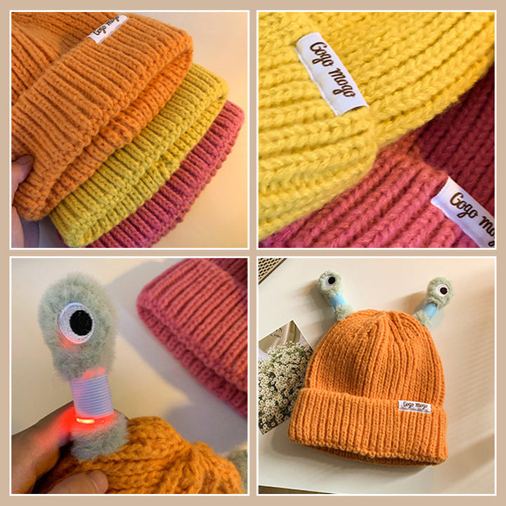 Back view of a black knit monster hat, showcasing its unique design